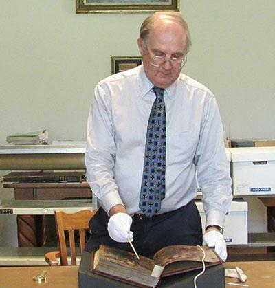 Graham handling manuscript