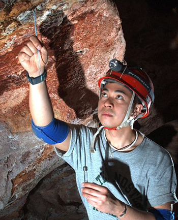 Researcher in Cave